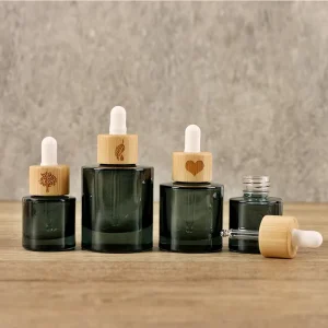15ml 30ml 50ml Dark Green Cylinder Glass Essential Oil Dropper Bottle with Bamboo Cap Skin Care Serum and Eye Drop Screen Printed