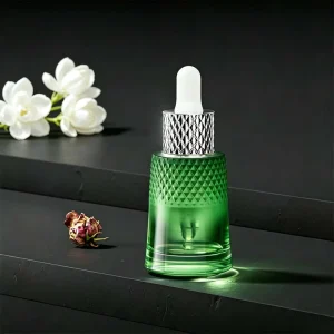 30ml 1oz Thick Base Emerald Green Embossed Glass Dropper Bottle for Natural Organic Facial Serum Packaging