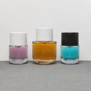 50ml 100ml Cylinder Glass Perfume Bottles with Pump Sprayer and Stylish Caps for Home Boutique Display