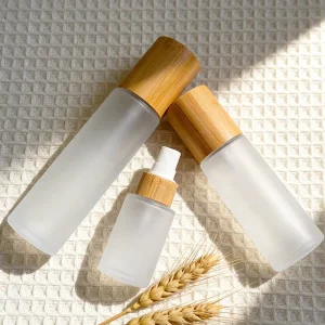 Cosmetic Packaging Bamboo Glass Bottle with Bamboo Pump Sprayer Lotion Cap for Cosmetic Packaging
