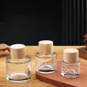 Custom Design 30ml 50ml 100ml Transparent Cylinder Glass Perfume Bottle with Wooden Cap Empty 100ml Frascos Vidrio Para Perfume