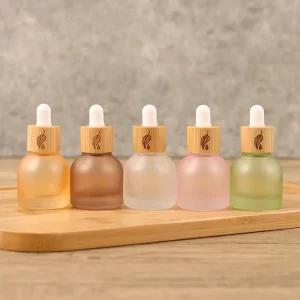 Custom Logo 10ml Essential Oils Cylinder Frosted Glass Dropper Bottle Natural Bamboo Wooden Screw Cap Mini Perfume Container