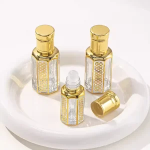 Dubai Empty Glass Essential Perfume Oil Bottle with Roll On Sealing and Golden UV Engraved Pattern