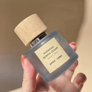 Eco friendly Sustainable Frosted Glass Perfume Bottle with Natural Wooden Lid 50ml Empty Round Fragrance Mist Spray Bottle