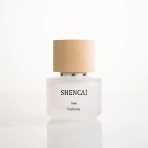 Fragrance Custom Cylinder Frosted Empty Perfume 50ml Parfum Glass Bottle with Pump Sprayer and Decal Wood Cap