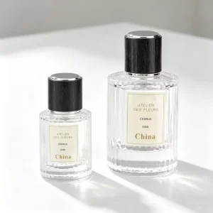 High Quality 30ml 50ml Textured Clear Glass Cylinder Perfume Oil Bottle with Lid and Sprayer for Fragrance Cosmetics