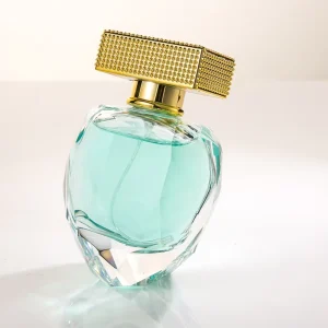 Manufacturer Customized 70ml Translucent 20oz Perfume Bottles with Fine Gold Cap and Pump Sprayer Irregular Fragrance Empty