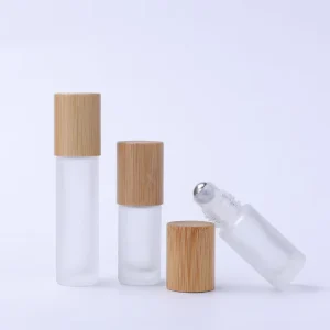 Round 5ml 10ml Frosted Empty Massage Essential Oil Attar Roll on Perfume Oil Glass Bottles with Bamboo and Plastic Wood Grain Lid