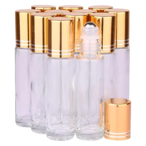 Stock 10ml Clear Glass Roll on Oil Bottle Perfume Ball Bottle with Metal Roller and Gold Cover Lid