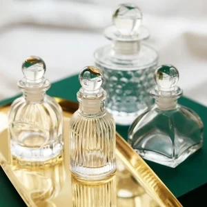 Vintage Embossed Perfume Aromatherapy Glass Bottle with Lid Seal Empty Transparent Floral Arrangement